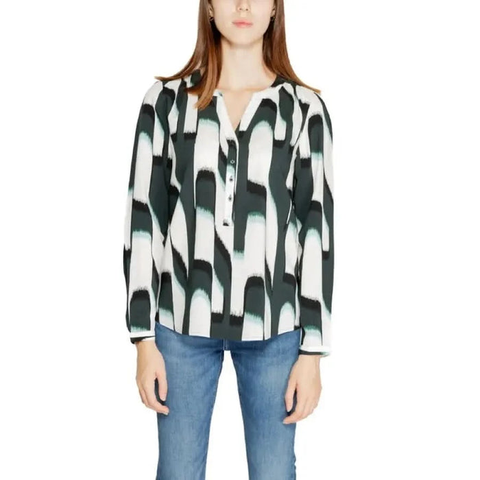 Abstract patterned blouse with black and white shapes on a light background by Street One