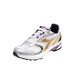 Athletic running shoe featuring silver, white, gold, and purple accents by Diadora