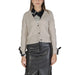 Beige cardigan sweater with black collar and cuffs over a leather skirt by Vila Clothes