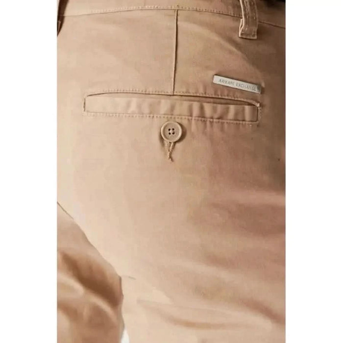 Beige chino pants with buttoned back pocket and Armani Exchange label in Armani Exchange Men Trousers