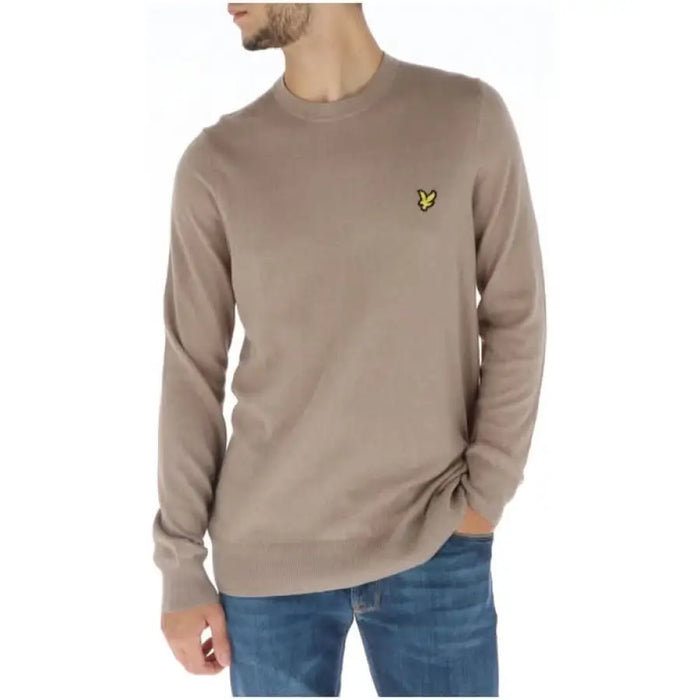 Beige crew neck sweater featuring Lyle & Scott eagle logo patch for men’s knitwear