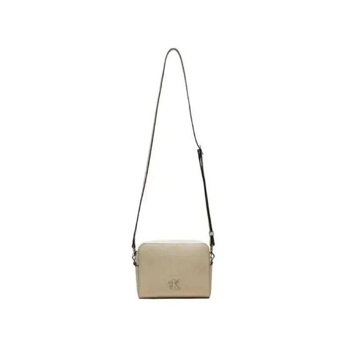 Beige leather crossbody handbag with adjustable strap by Calvin Klein Jeans