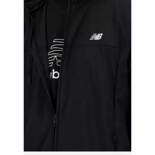 Black athletic jacket featuring New Balance logo and branding, New Balance Men Blazer