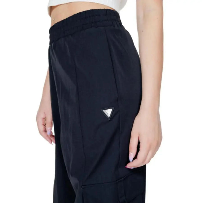 Black athletic pants with elastic waistband and triangular logo - Guess Active Women Trousers