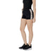 Black athletic shorts with logo stripe from Guess Active for women, featuring laces