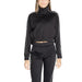 Black athletic tracksuit with cropped top and high-waisted pants by Calvin Klein Sport