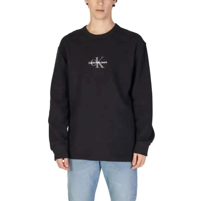 Black Calvin Klein sweatshirt featuring a small monogram logo on the chest