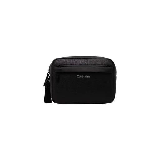 Black Calvin Klein leather toiletry bag with zipper closure for men’s travel essentials