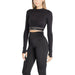 Black Calvin Klein crop top with long sleeves and a branded elastic band at the waist.