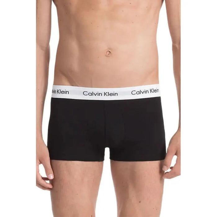 Black Calvin Klein boxer briefs with white elastic waistband for men’s underwear