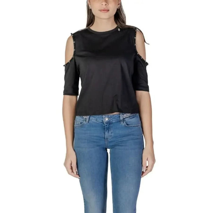 Black cold-shoulder Liu Jo 3/4 sleeve top with frayed edges paired with blue jeans