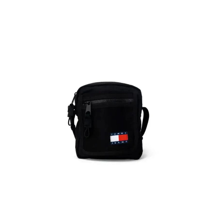 Black crossbody bag featuring Tommy Hilfiger logo from Tommy Hilfiger Jeans collection