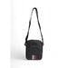 Black crossbody bag featuring striped logo detail from Tommy Hilfiger Men Bag collection