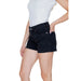 Vero Moda Women’s Black Denim Shorts paired with a white top