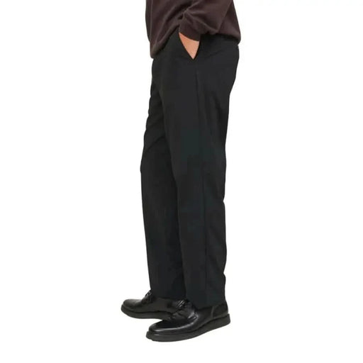 Black dress pants from Jack & Jones featuring hands in pockets for a polished look