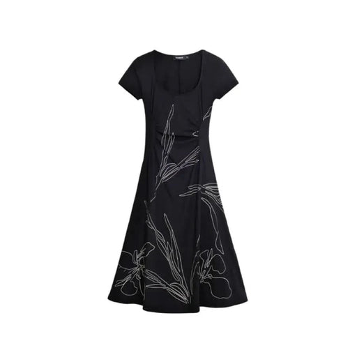 Black dress with white floral design from Desigual, elegant attire for women