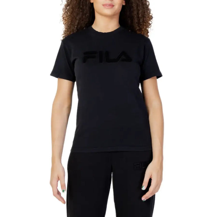 Black FILA logo t-shirt worn by a person with curly hair modeling Fila Women’s T-Shirt