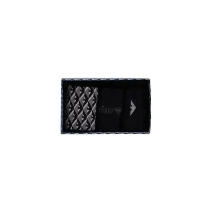 Black and gray diamond pattern patch with arrow design on Emporio Armani Underwear