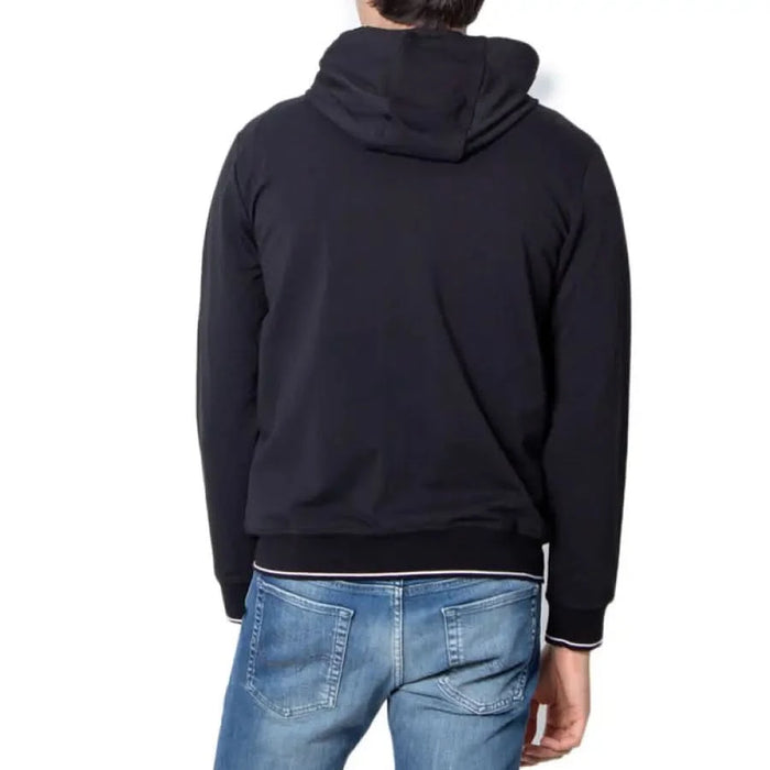 Back view of Black hooded sweatshirt over blue jeans Armani Exchange Men Sweatshirts