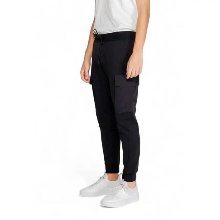 Black jogger-style Antony Morato men trousers with tapered legs and elastic waistband