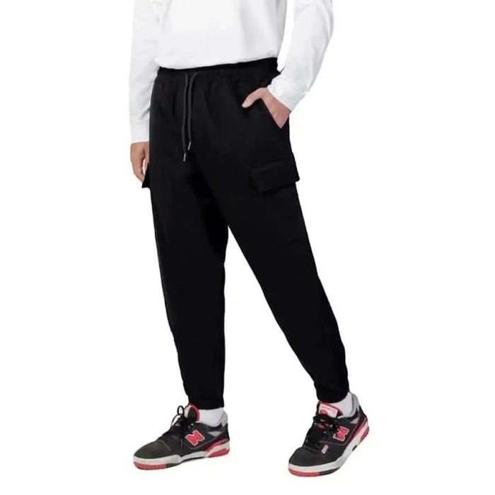 Black jogger-style pants with drawstring waist, ideal Hydra Clothing fall winter product