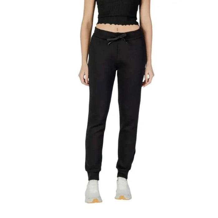 Black jogger sweatpants with elastic cuffs and drawstring waist by Armani Exchange Women