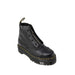 Dr. Martens women’s black leather combat boot with chunky sole and front zipper