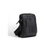 Black leather crossbody bag by Calvin Klein featuring multiple zippered compartments