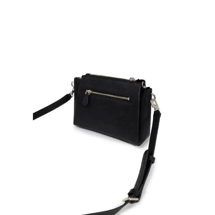 Black leather crossbody bag by Guess featuring front zipper pocket and adjustable strap