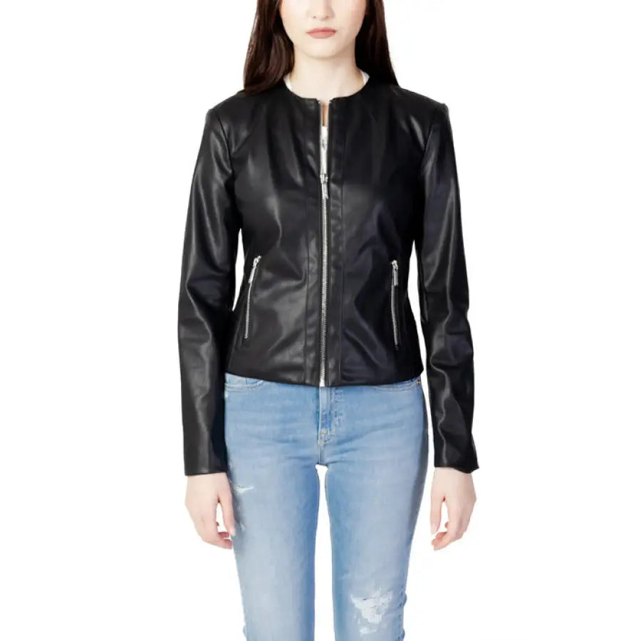 Armani Exchange black leather jacket with zip and pockets, paired with light blue jeans
