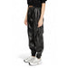 Black leather-look jogger pants with elastic waistband and cuffed ankles by Only