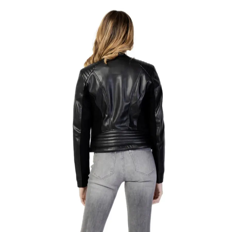 Blonde woman wearing Guess black leather motorcycle jacket from the Women Blazer collection