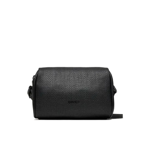 Black leather toiletry bag with textured surface and zipper closure by Calvin Klein Jeans