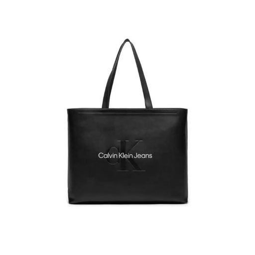 Black leather tote bag featuring Calvin Klein Jeans branding in Calvin Klein Women Bag