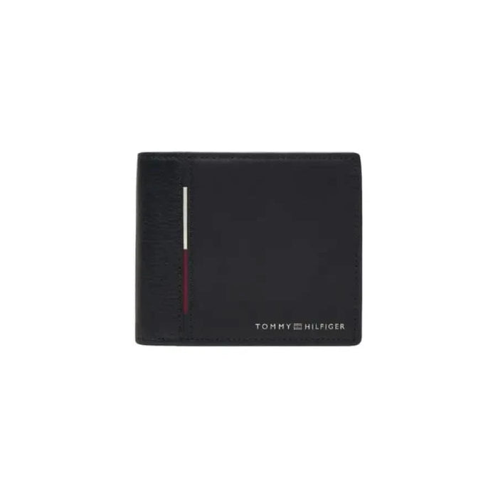 Black leather Tommy Hilfiger men wallet featuring a sleek red and white stripe detail