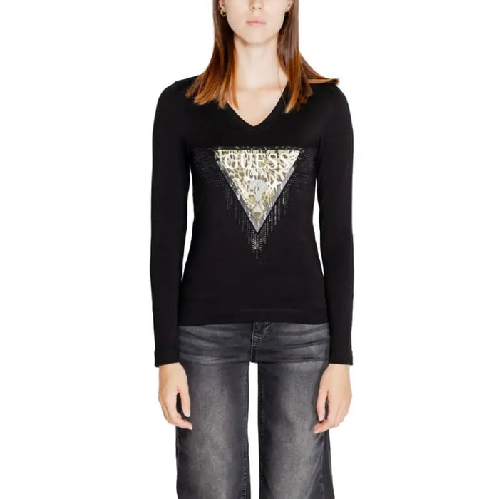 Black long-sleeved Guess T-shirt featuring a metallic triangle logo on the chest