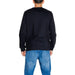 Back view of a Black long-sleeved sweatshirt with blue jeans from Calvin Klein Jeans Men collection