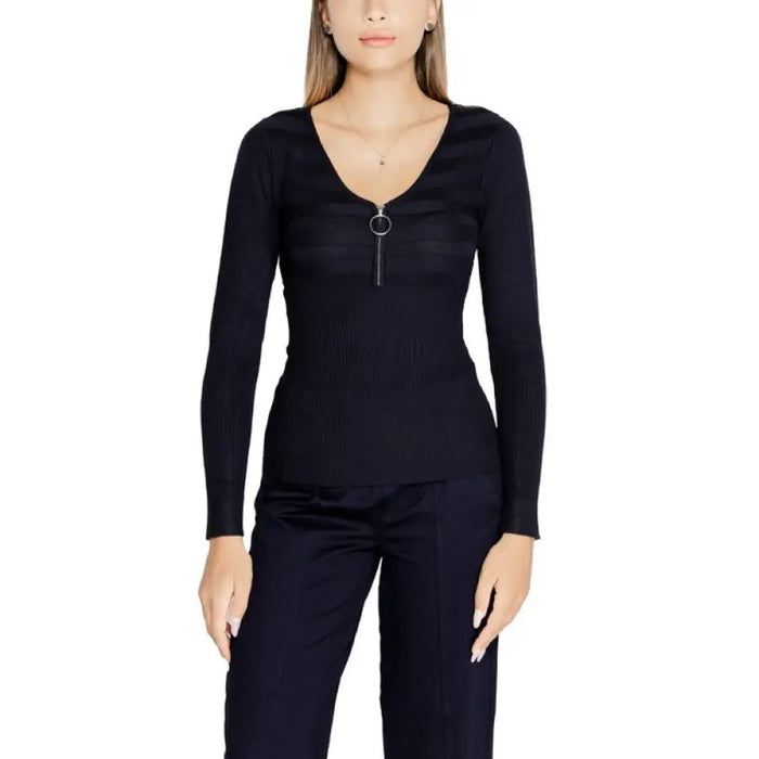 Black long-sleeved V-neck top with zipper detail by Morgan De Toi for women