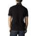 Black polo shirt with white trim on collar and sleeves by Armani Exchange Men