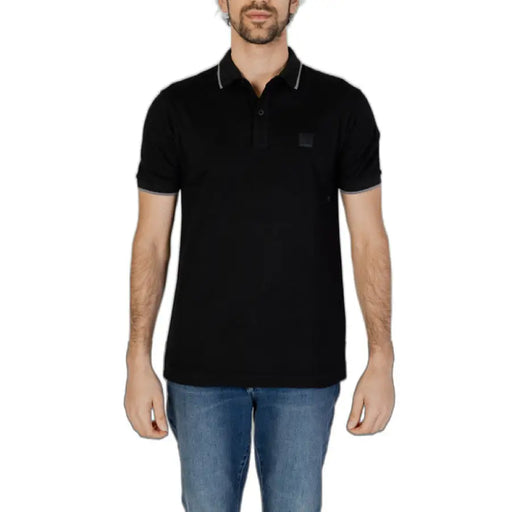 Black polo shirt with white collar trim from Boss Men’s Spring/Summer Collection