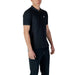 Black polo shirt and sweatpants outfit featuring Colmar Originals Men’s Blue Cotton Polo