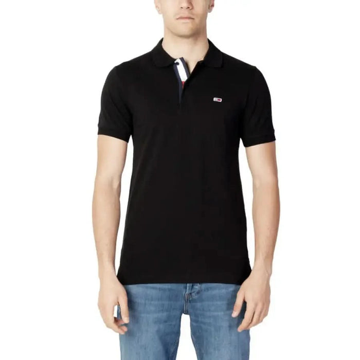 Black polo shirt with small logo on chest from Tommy Hilfiger Jeans for men