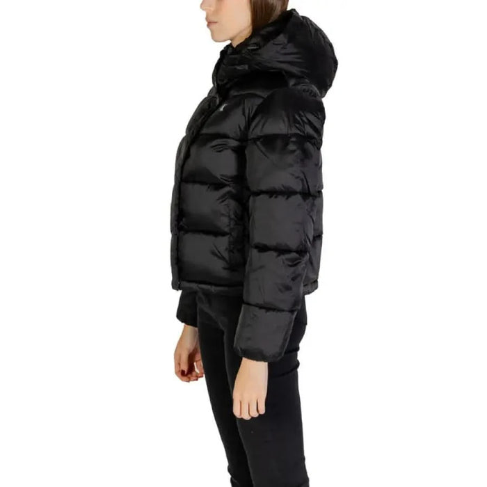 Black puffer jacket with hood from Calvin Klein Jeans for women, stylish and versatile