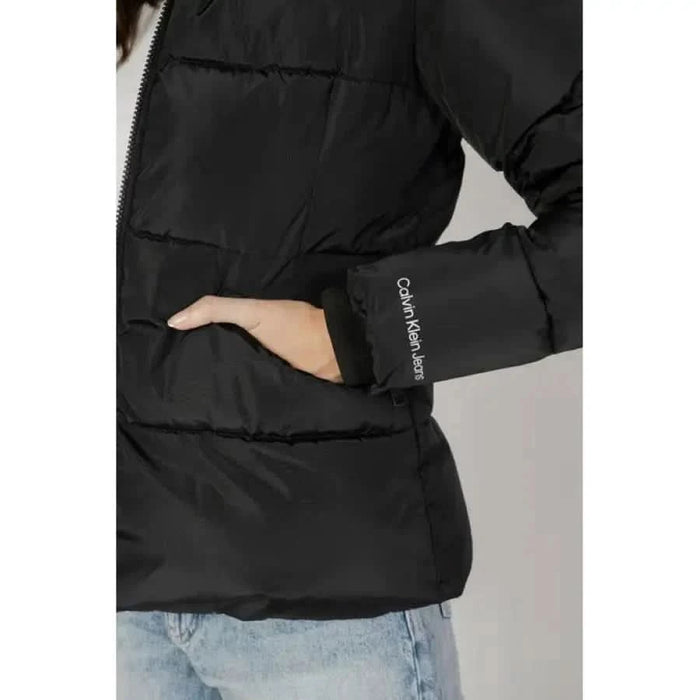 Black Calvin Klein Jeans puffer jacket with logo on sleeve for women