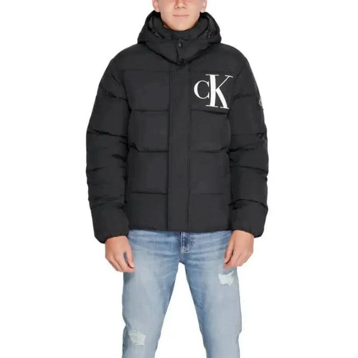 Black puffer jacket with CK logo on chest from Calvin Klein Men’s collection