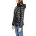 Black puffy hooded jacket worn with jeans, showcasing Blauer Women Jacket style