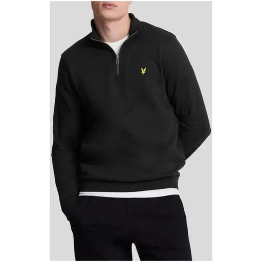 Black quarter-zip sweater by Lyle & Scott with yellow logo on chest for men