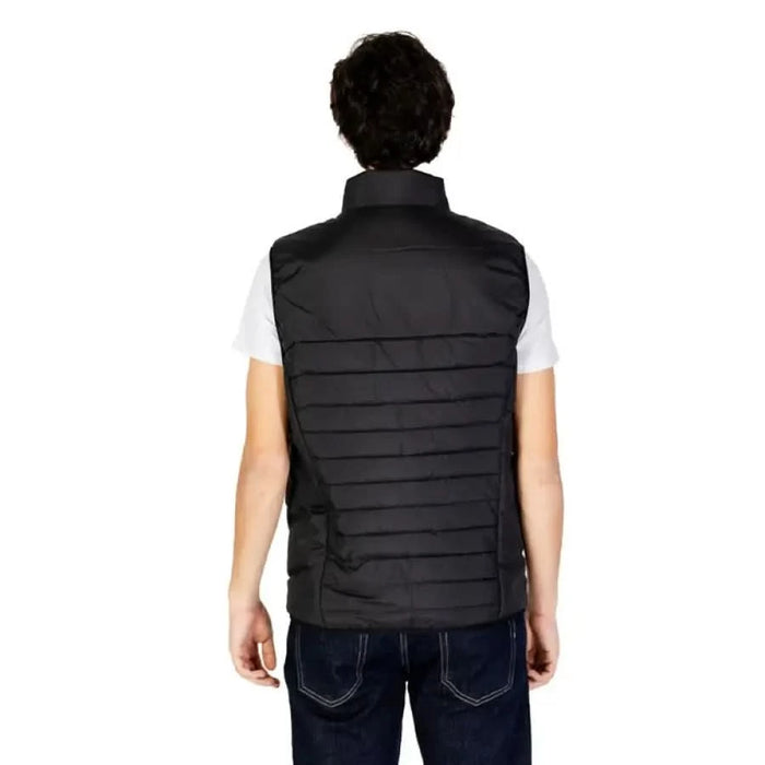 Black quilted puffer vest over white t-shirt from Boss - Boss Men Jacket collection