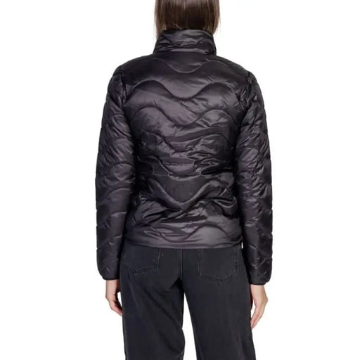 Black quilted puffer jacket from the back featured in Only Women Jacket collection