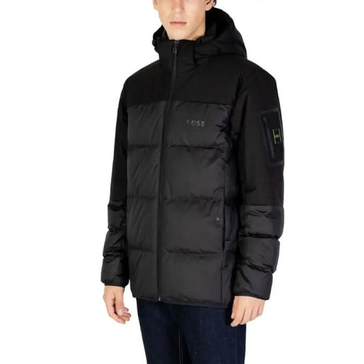 Black quilted winter puffer jacket with hood and zipper closure from Boss Men Jacket